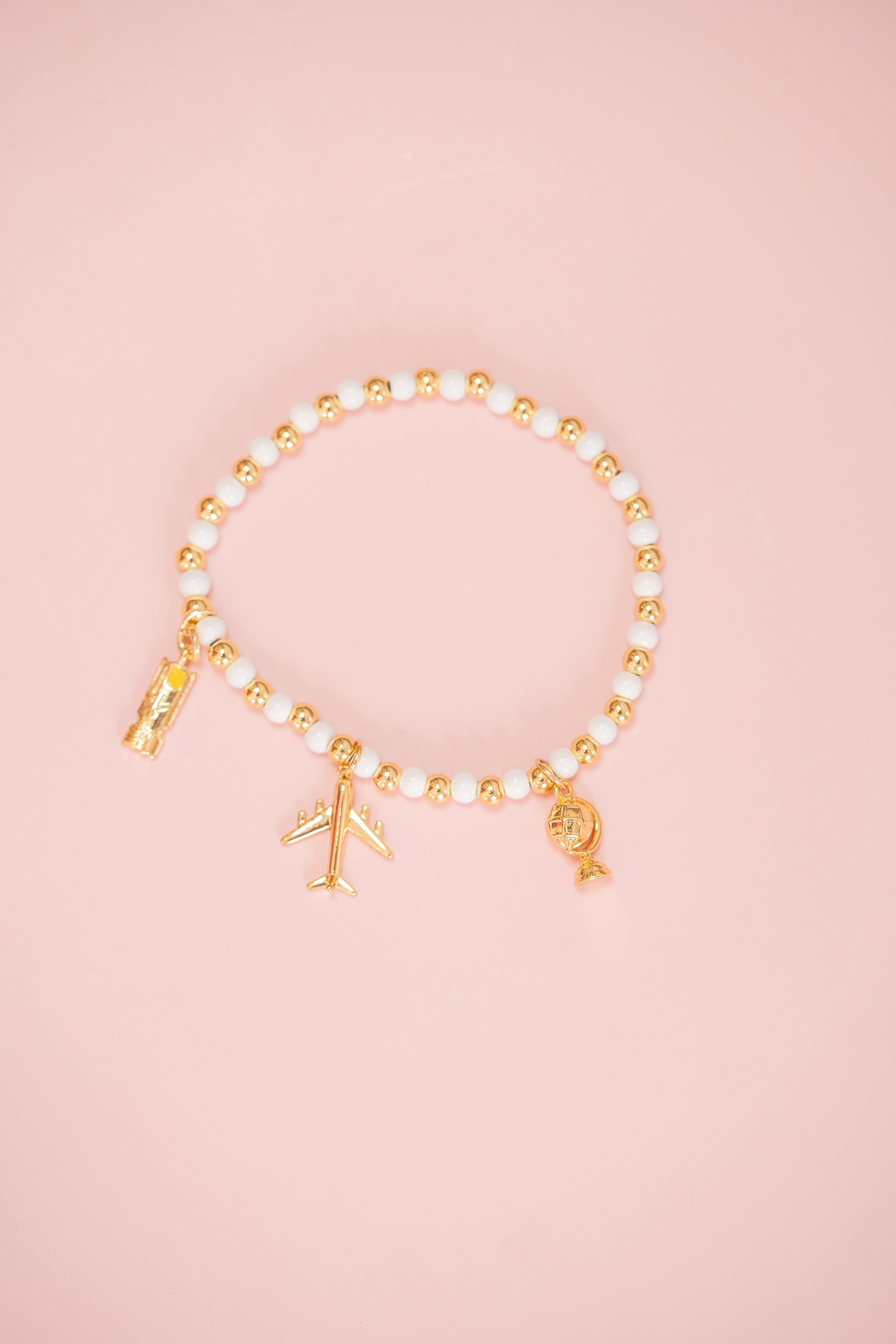 White and Gold Beaded Charm Bracelet