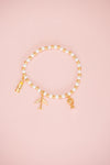 White and Gold Beaded Charm Bracelet