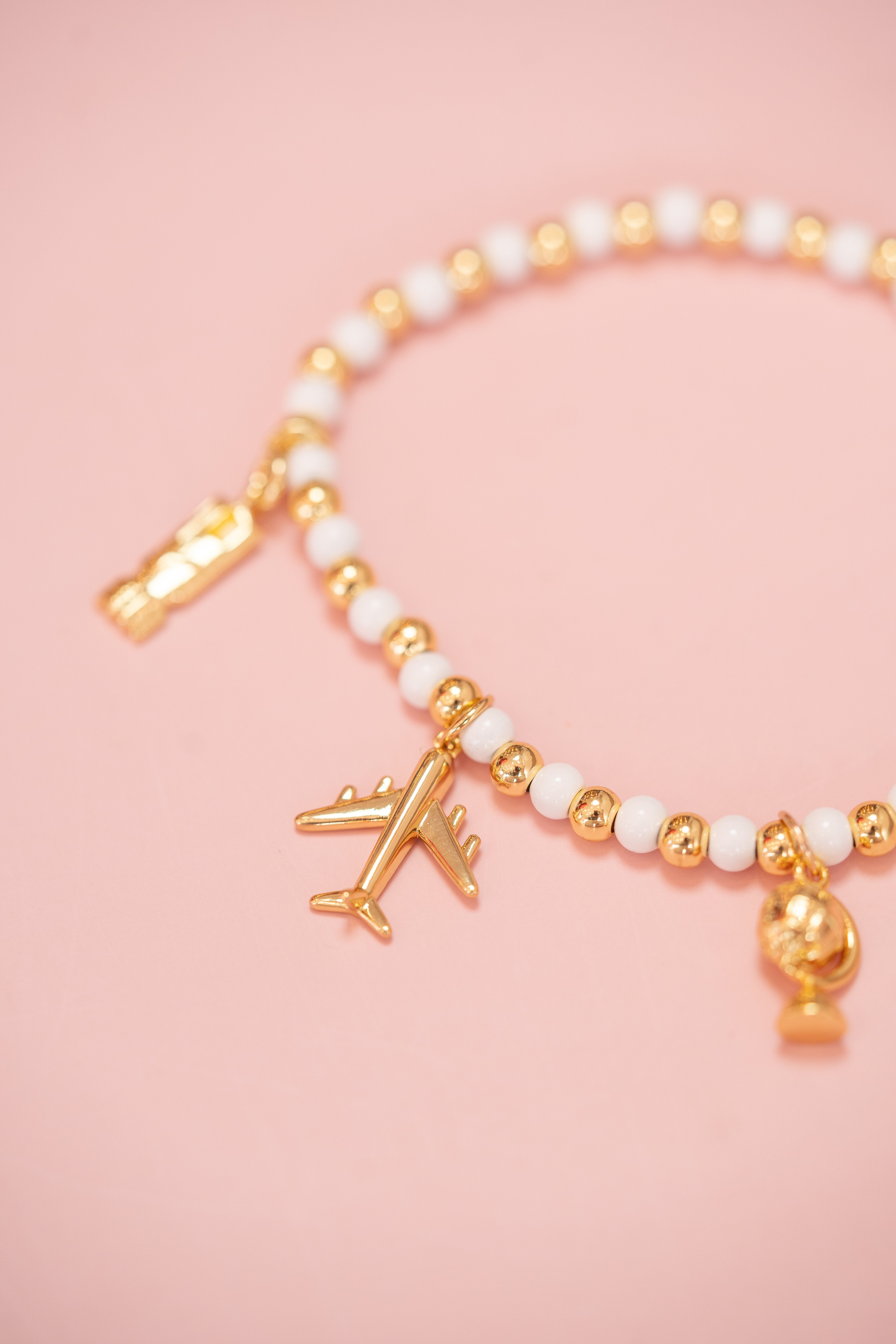 White and Gold Beaded Charm Bracelet