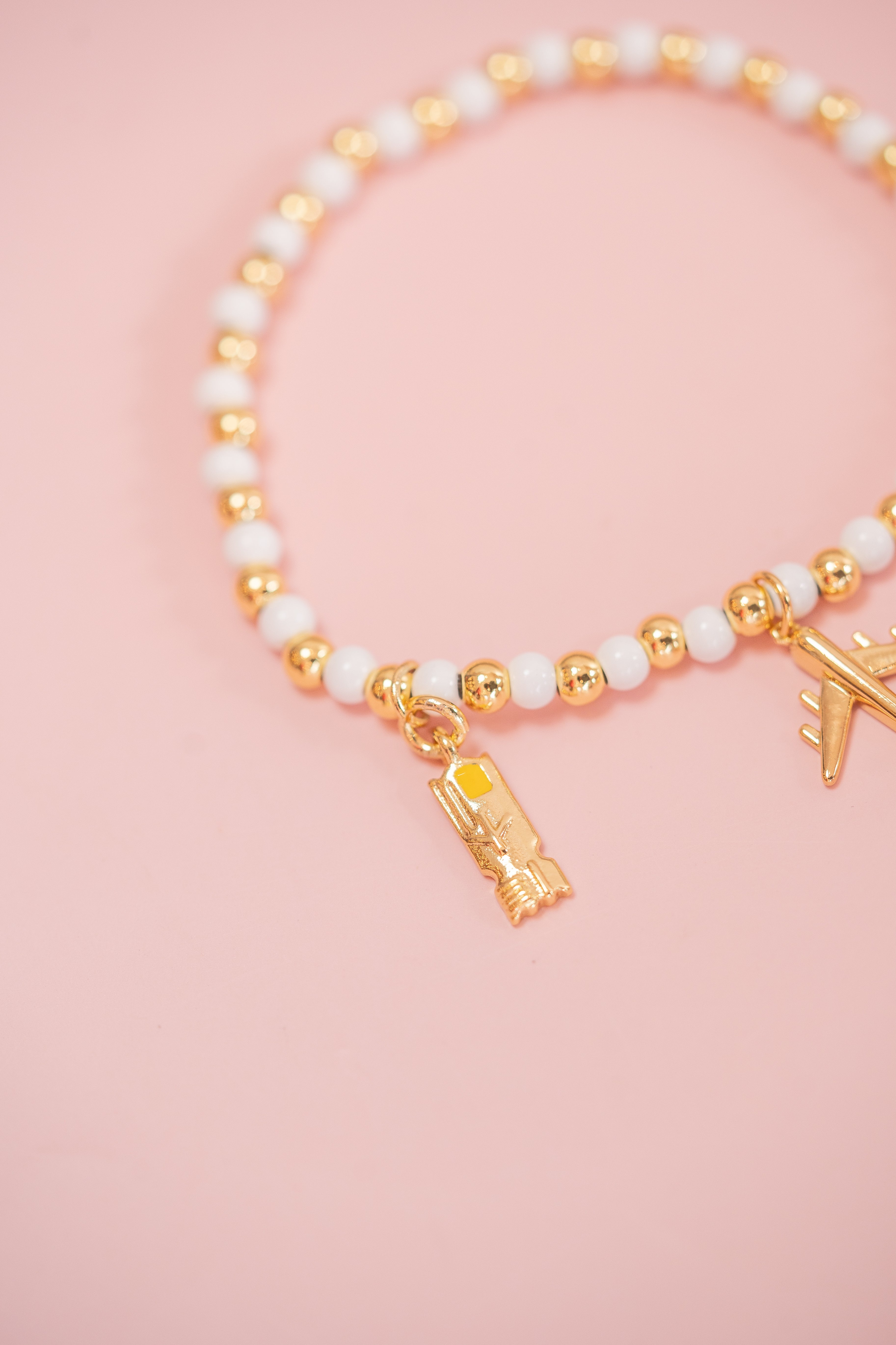 White and Gold Beaded Charm Bracelet
